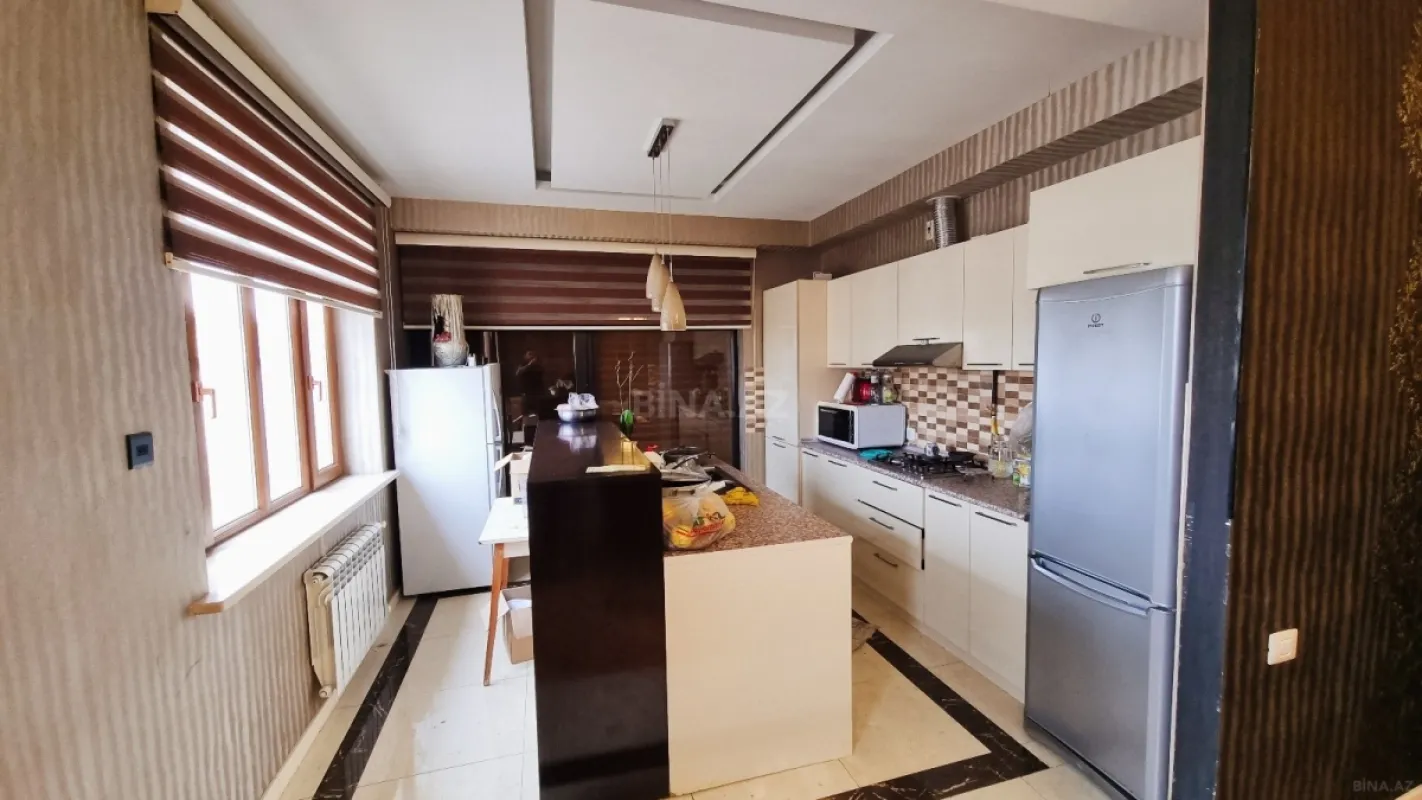 Satılır 4 otaqlı mənzil 132 m²