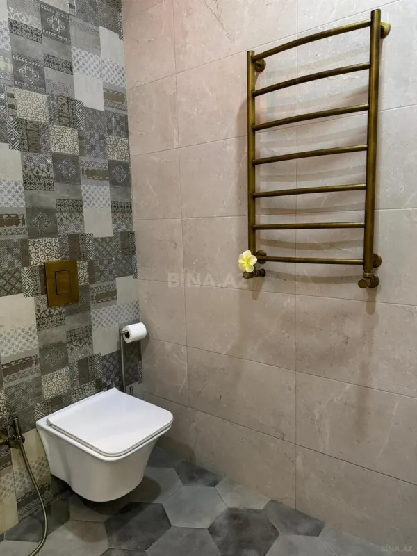 Satılır 4 otaqlı mənzil 157 m²