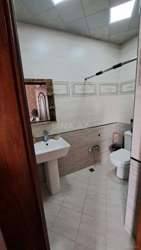 Satılır 4 otaqlı mənzil 141 m²