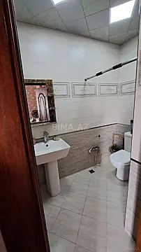 Satılır 4 otaqlı mənzil 141 m²