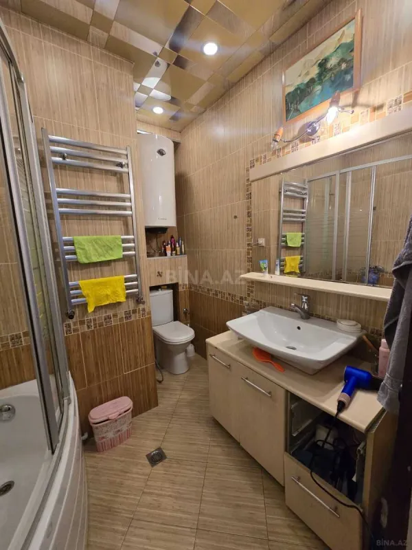 Satılır 4 otaqlı mənzil 103 m²