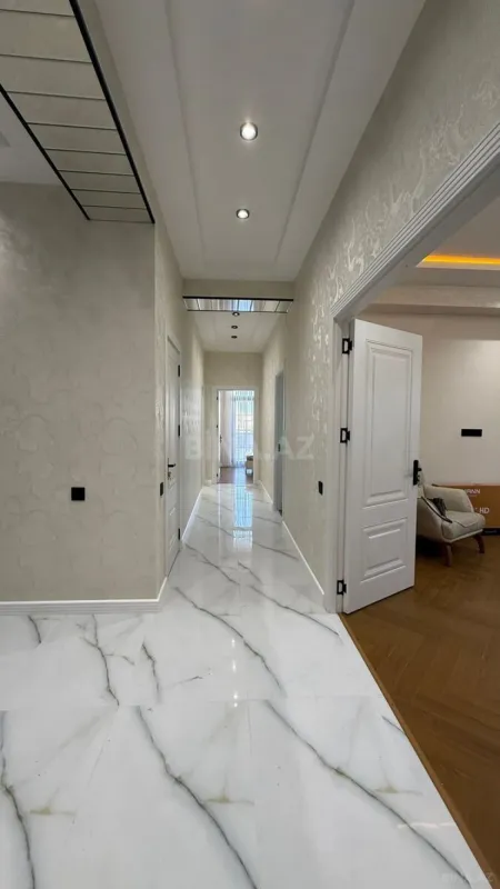 Satılır 4 otaqlı mənzil 136 m²