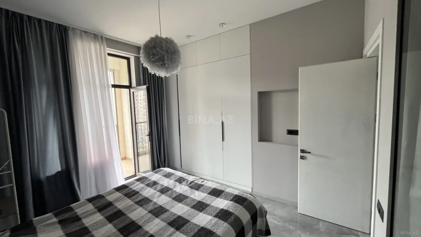Satılır 2 otaqlı mənzil 103 m²