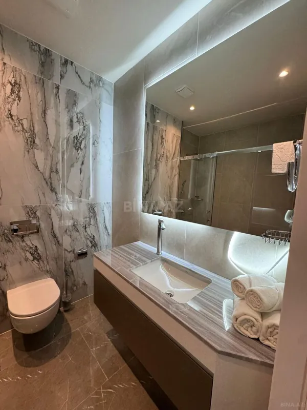 Satılır 1 otaqlı mənzil 57 m²