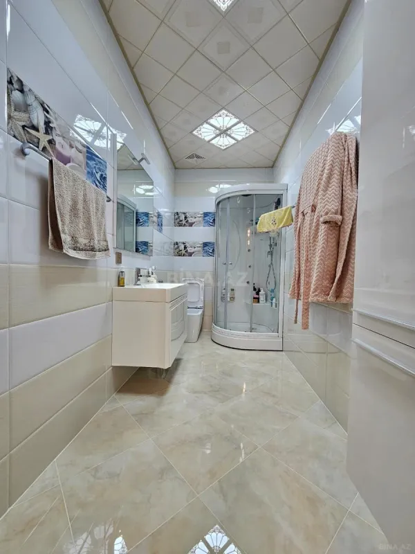 Satılır 4 otaqlı mənzil 223 m²