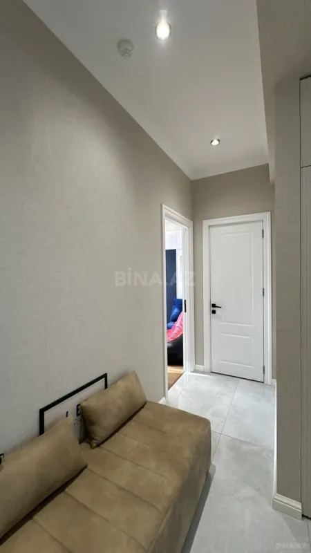 Satılır 4 otaqlı mənzil 121 m²