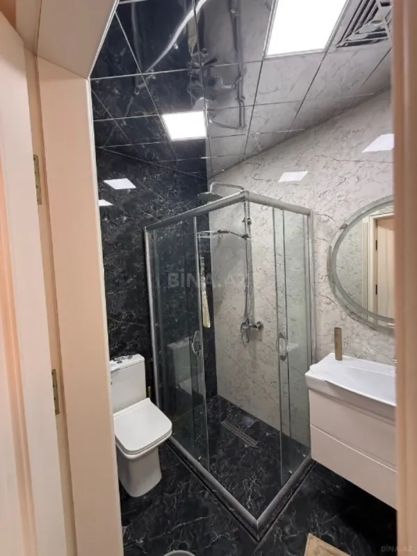 Satılır 4 otaqlı mənzil 180 m²