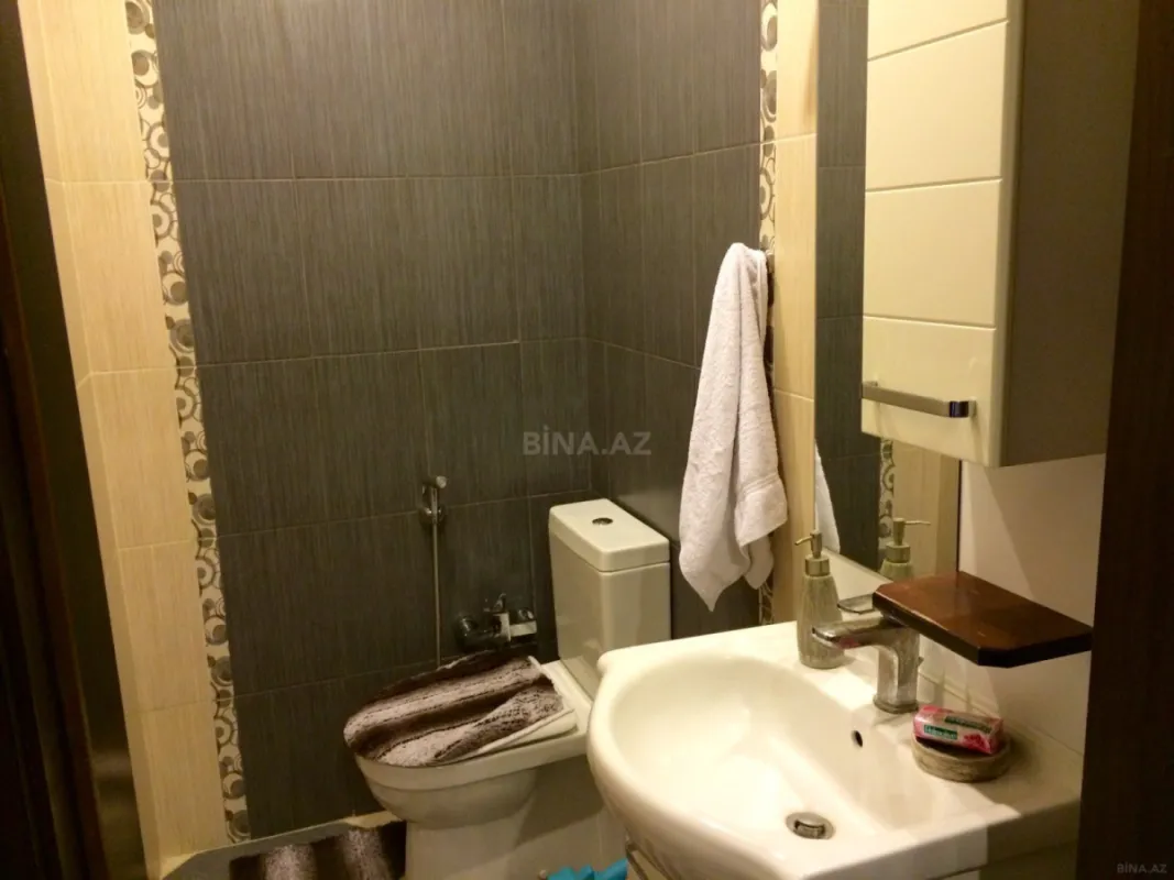 Satılır 4 otaqlı mənzil 117 m²