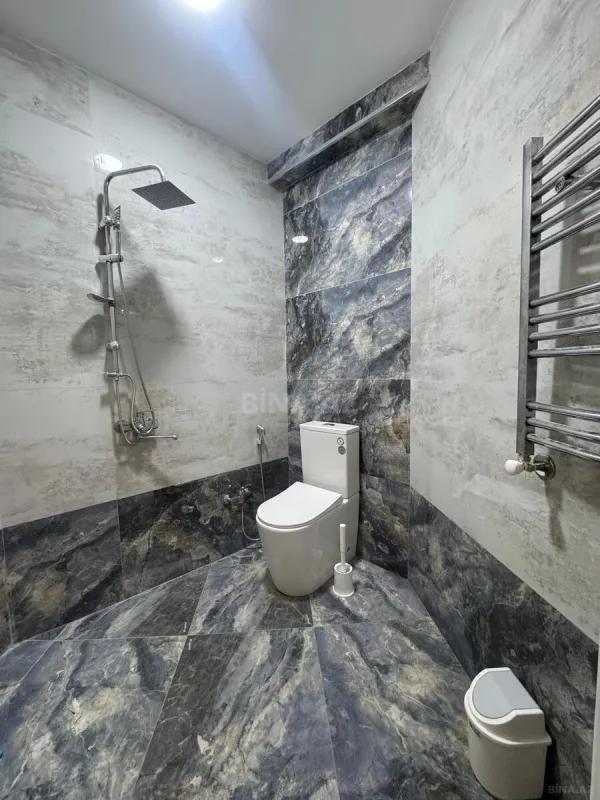 Satılır 4 otaqlı mənzil 210 m²