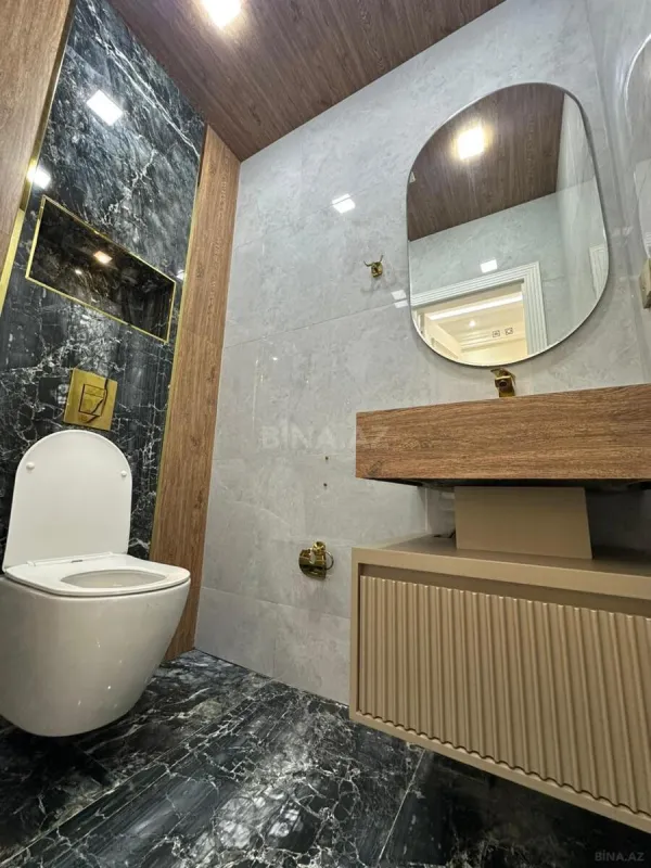 Satılır 4 otaqlı mənzil 174 m²