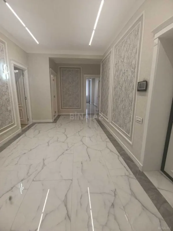 Satılır 4 otaqlı mənzil 165 m²