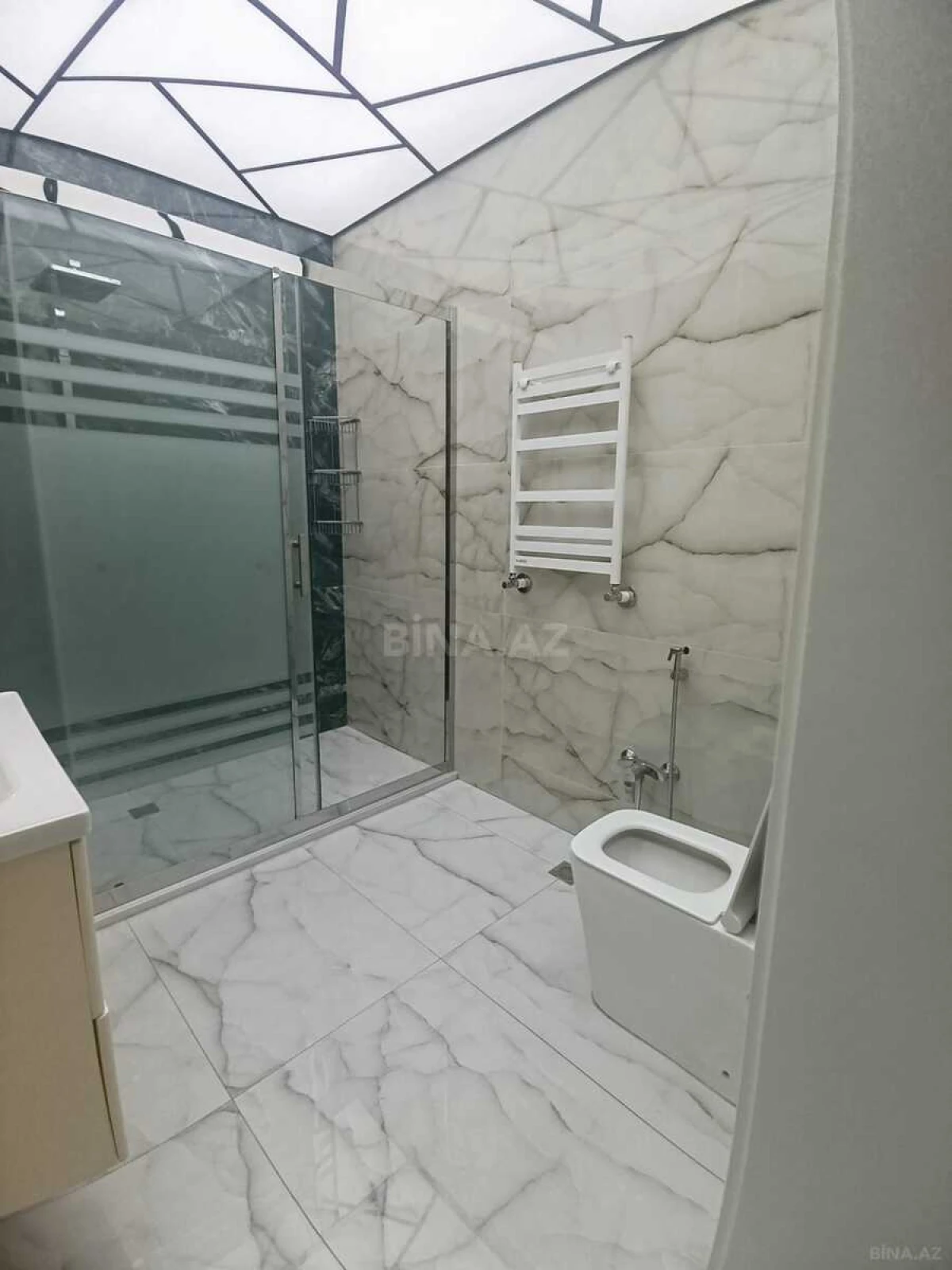 Satılır 4 otaqlı mənzil 165 m²
