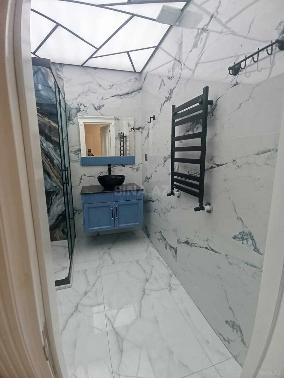 Satılır 4 otaqlı mənzil 165 m²