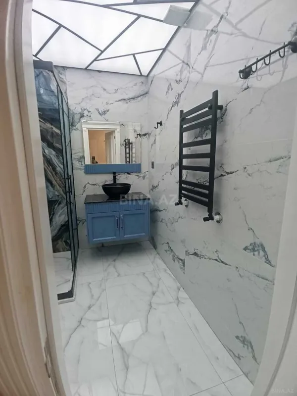 Satılır 4 otaqlı mənzil 165 m²