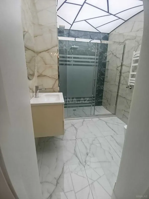 Satılır 4 otaqlı mənzil 165 m²