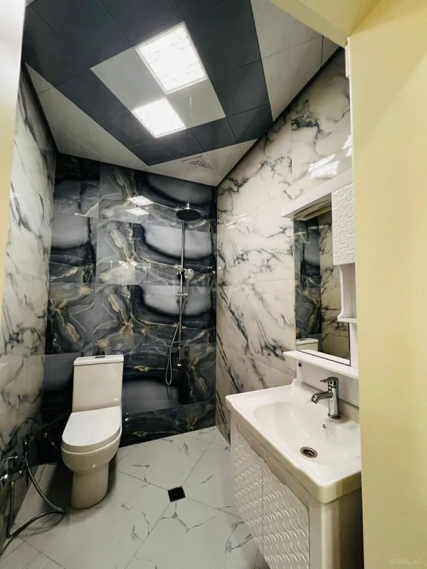 Satılır 4 otaqlı mənzil 165 m²