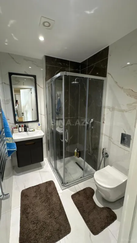 Satılır 4 otaqlı mənzil 121 m²
