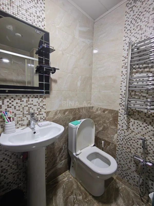 Satılır 2 otaqlı mənzil 64 m²