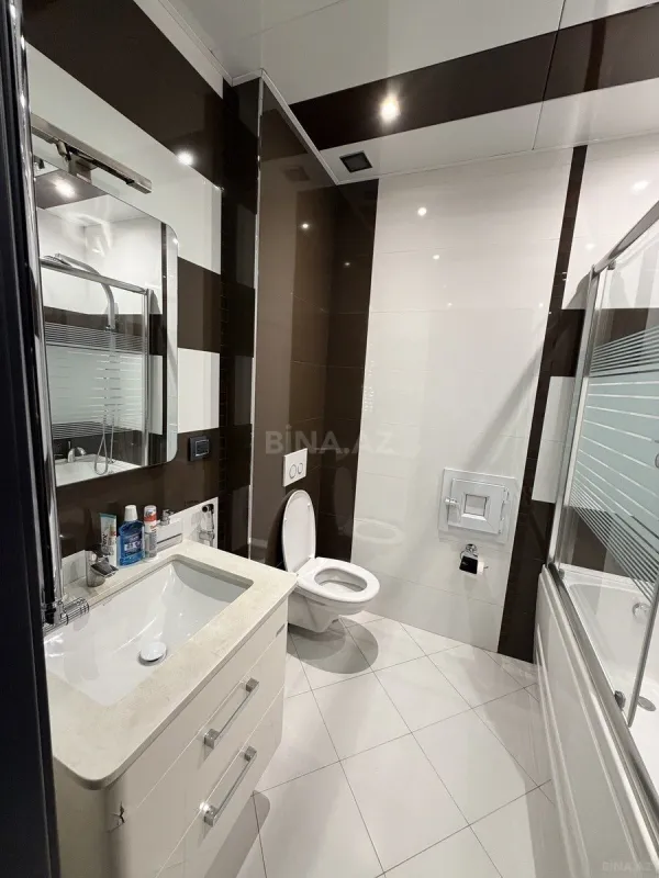 Satılır 4 otaqlı mənzil 153 m²