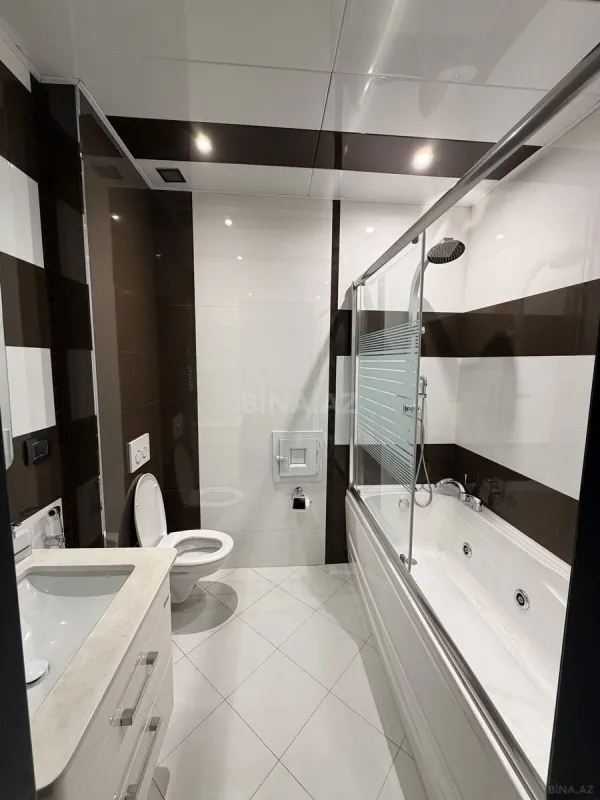 Satılır 4 otaqlı mənzil 153 m²