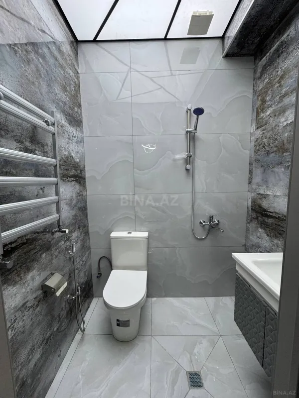 Satılır 2 otaqlı mənzil 55 m²