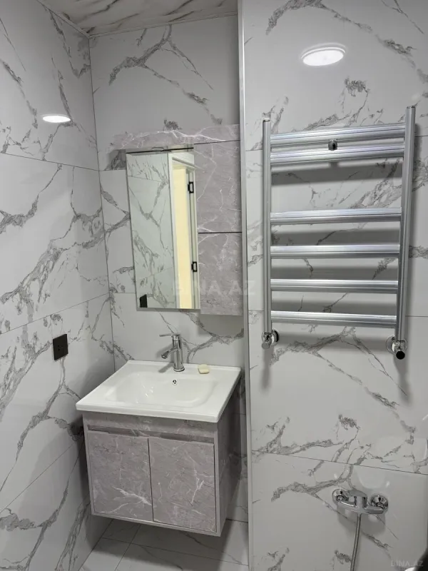 Satılır 2 otaqlı mənzil 61.9 m²