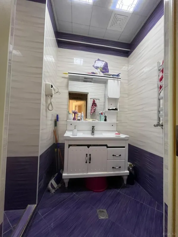 Satılır 4 otaqlı mənzil 146 m²