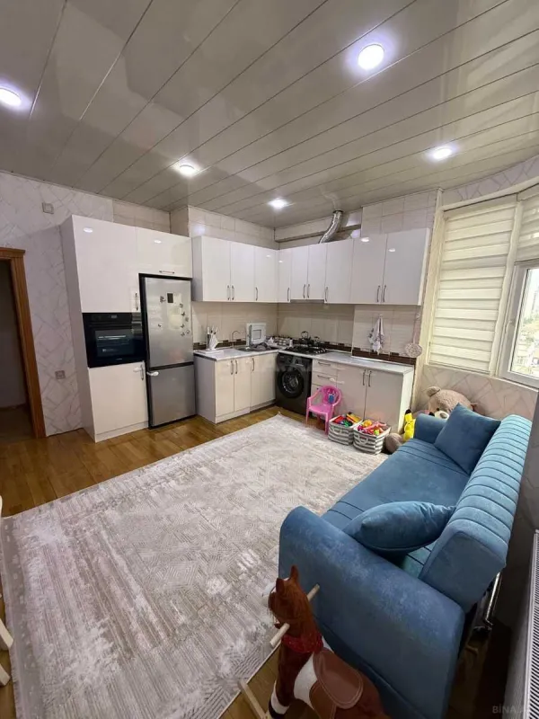 Satılır 2 otaqlı mənzil 98.8 m²