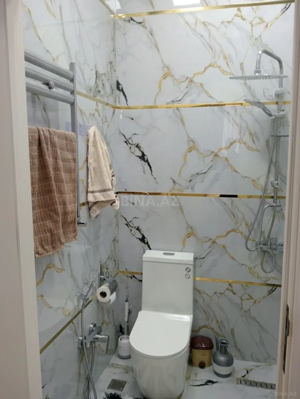 Satılır 4 otaqlı mənzil 136 m²
