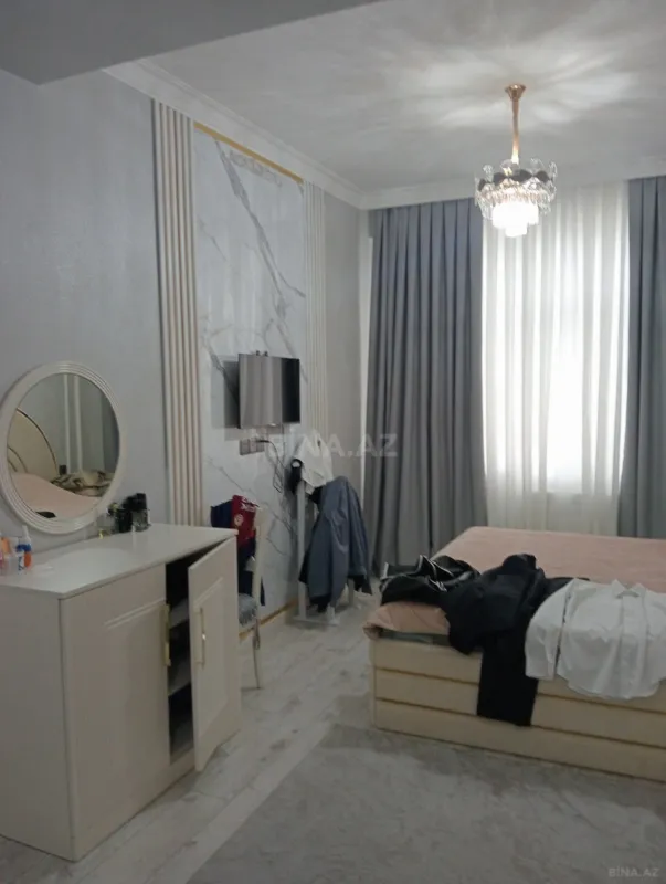 Satılır 4 otaqlı mənzil 136 m²