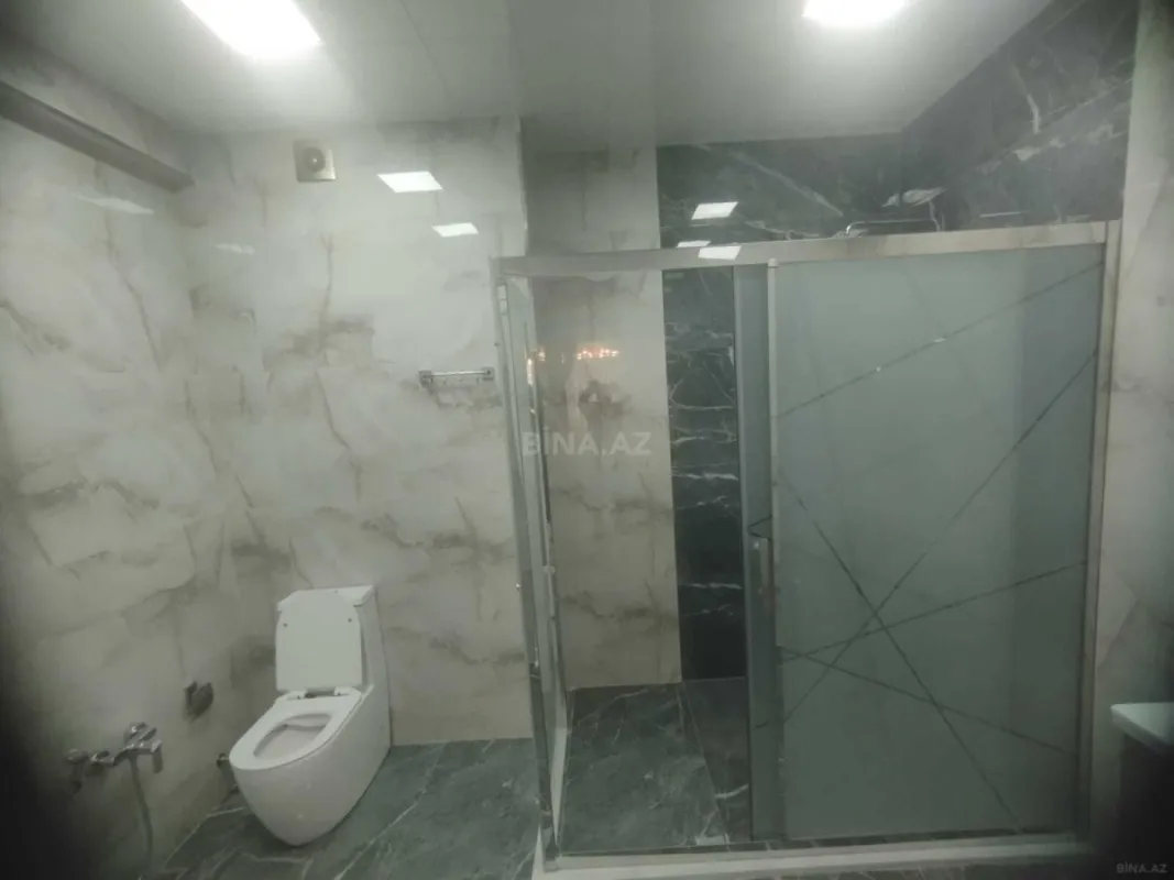 Satılır 4 otaqlı mənzil 215 m²