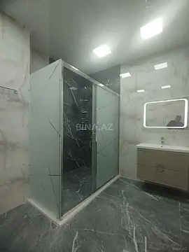 Satılır 4 otaqlı mənzil 215 m²