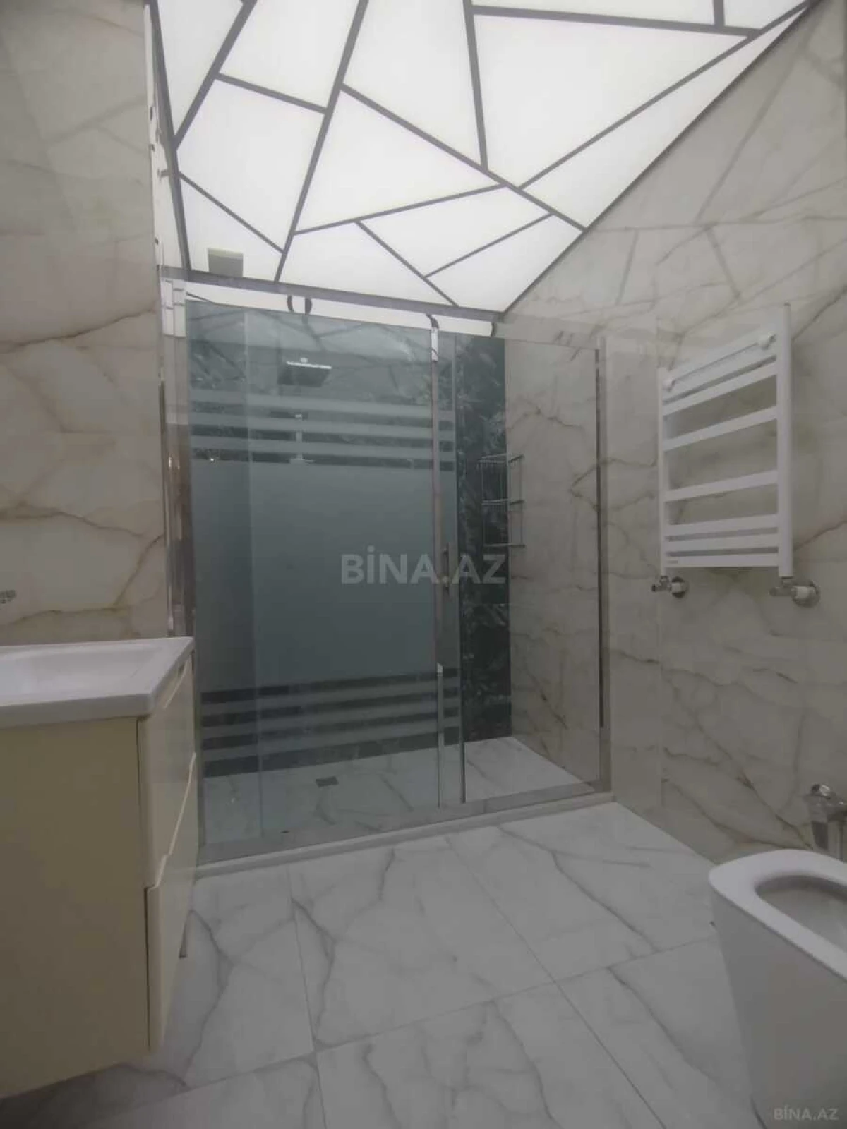 Satılır 4 otaqlı mənzil 164 m²