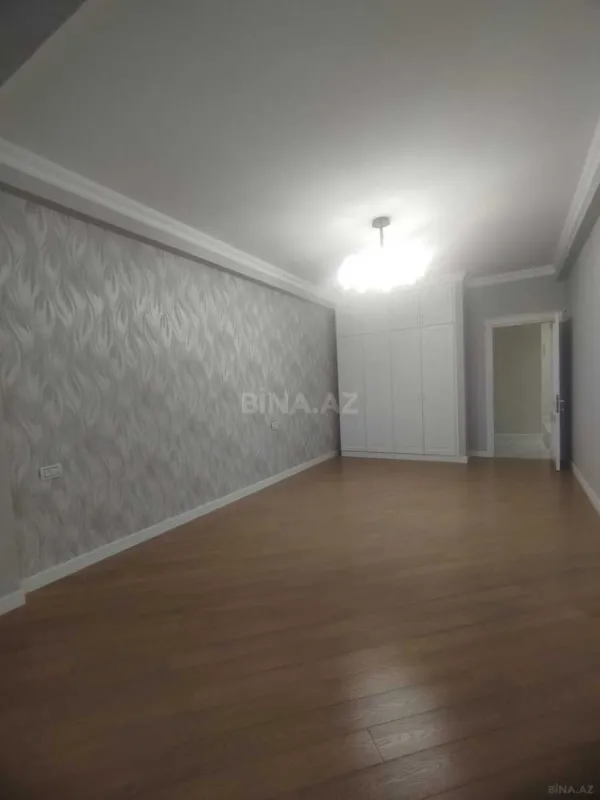 Satılır 4 otaqlı mənzil 164 m²