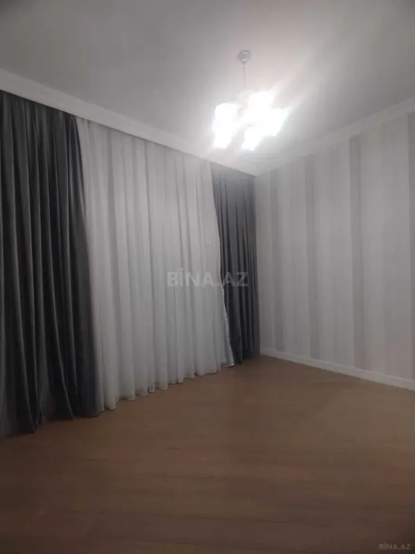 Satılır 4 otaqlı mənzil 164 m²