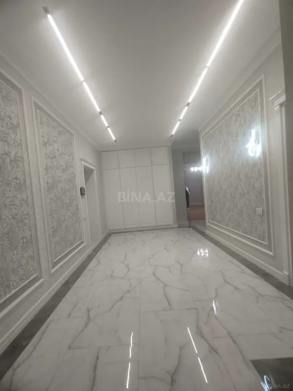 Satılır 4 otaqlı mənzil 164 m²