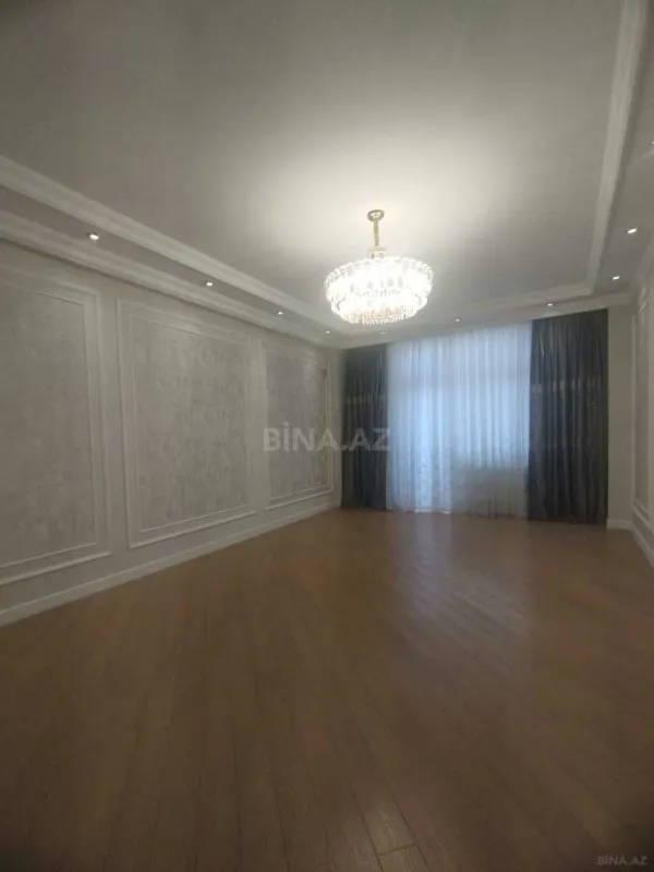 Satılır 4 otaqlı mənzil 164 m²