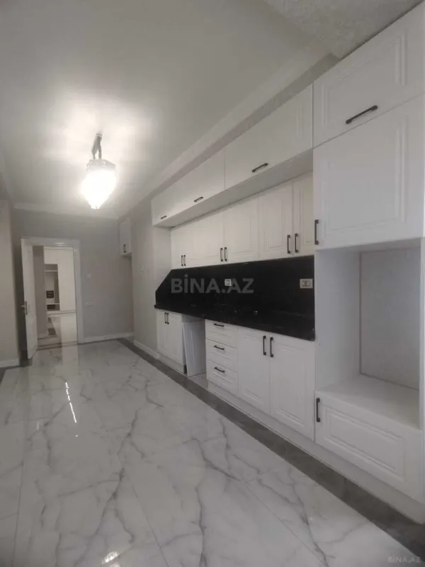 Satılır 4 otaqlı mənzil 164 m²