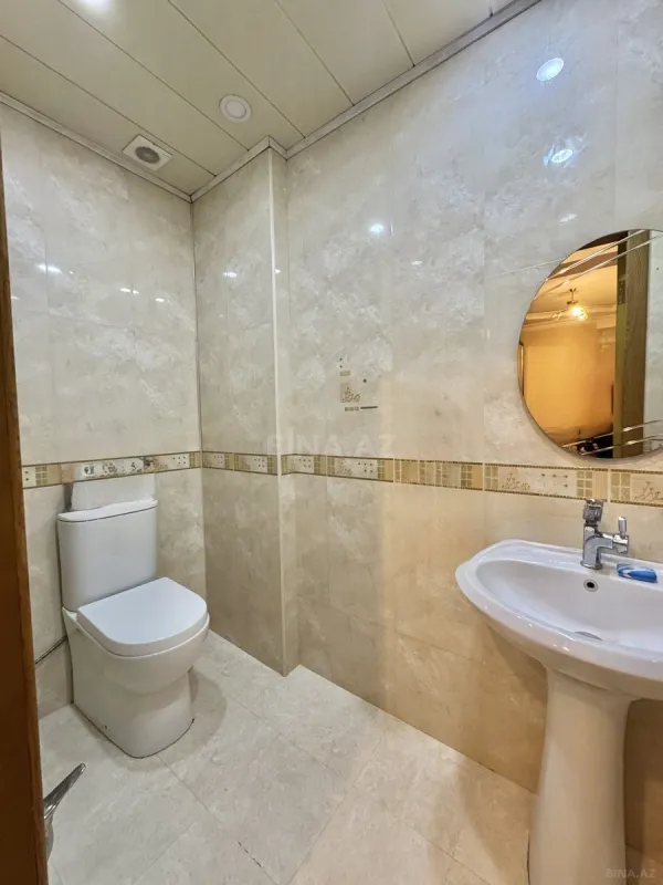 Satılır 4 otaqlı mənzil 141 m²