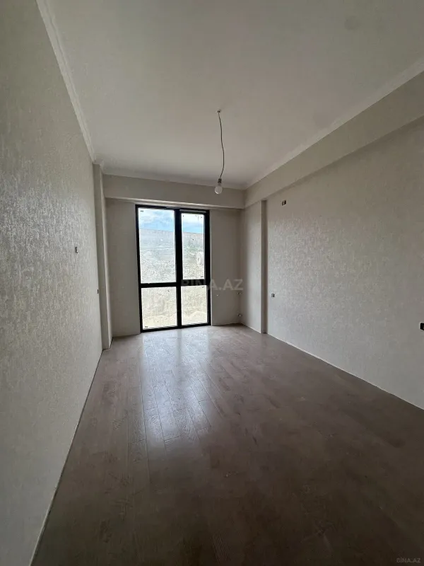 Satılır 2 otaqlı mənzil 72.6 m²