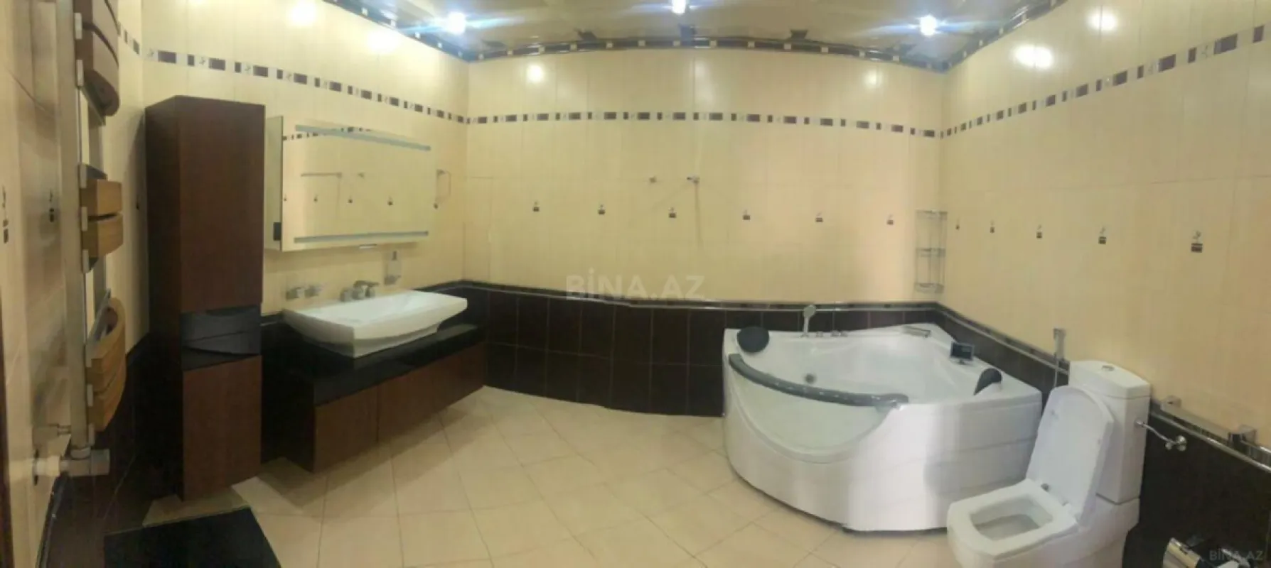 Satılır 4 otaqlı mənzil 217 m²