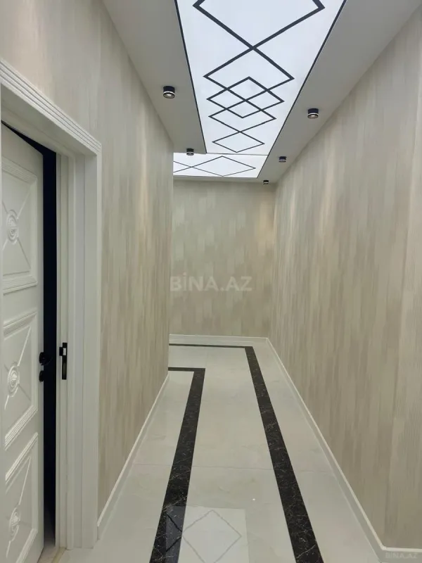 Satılır 4 otaqlı mənzil 142 m²
