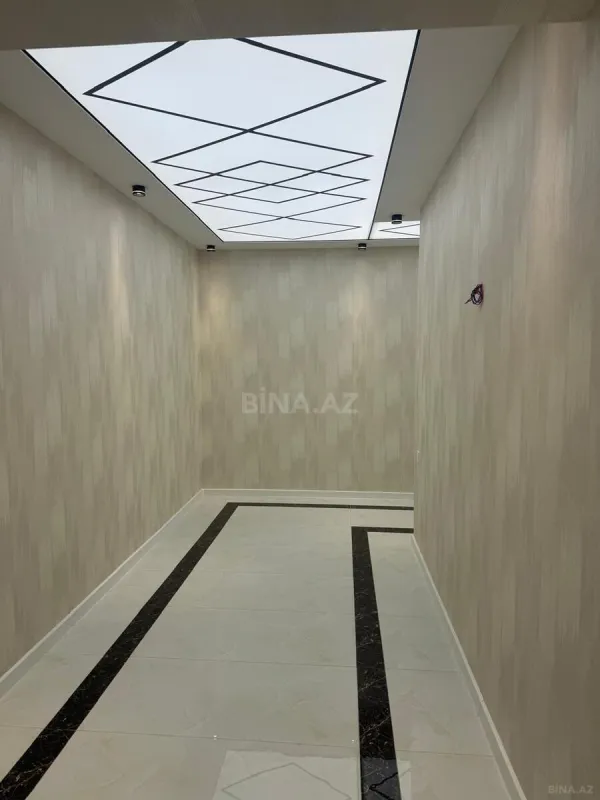 Satılır 4 otaqlı mənzil 142 m²