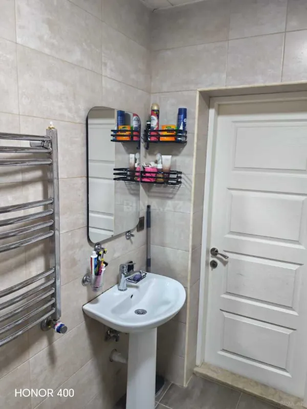 Satılır 2 otaqlı mənzil 74.4 m²