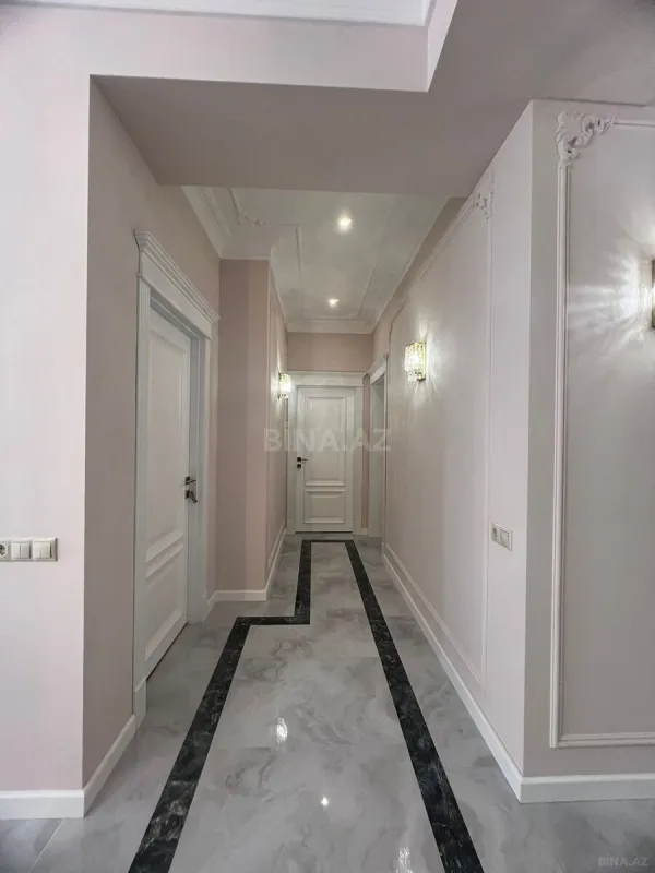Satılır 4 otaqlı mənzil 128 m²