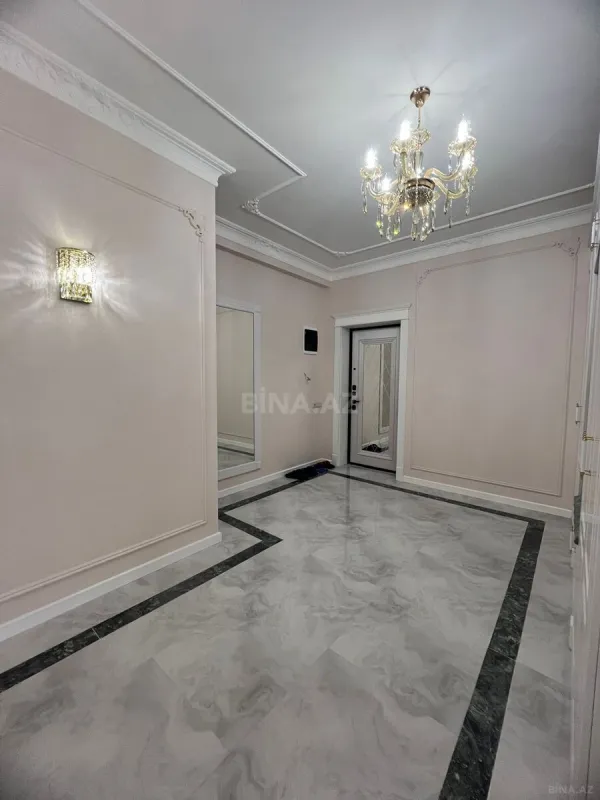 Satılır 4 otaqlı mənzil 128 m²