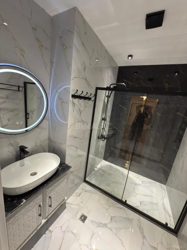 Satılır 3 otaqlı mənzil 138.4 m²