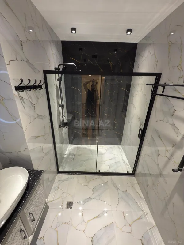 Satılır 3 otaqlı mənzil 138.4 m²