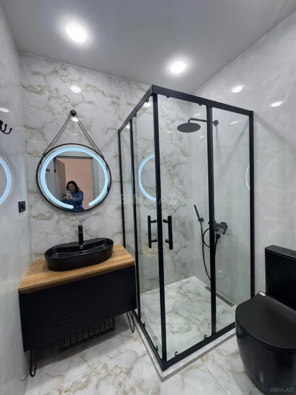 Satılır 4 otaqlı mənzil 141 m²