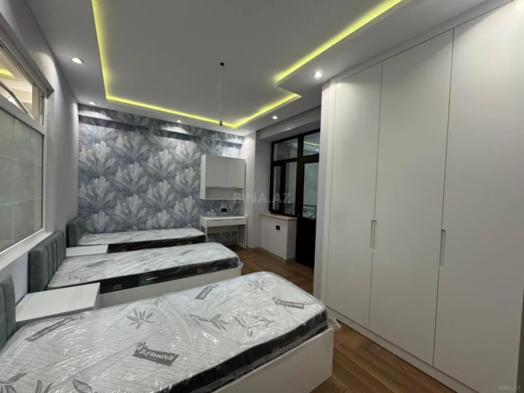 Satılır 4 otaqlı mənzil 141 m²